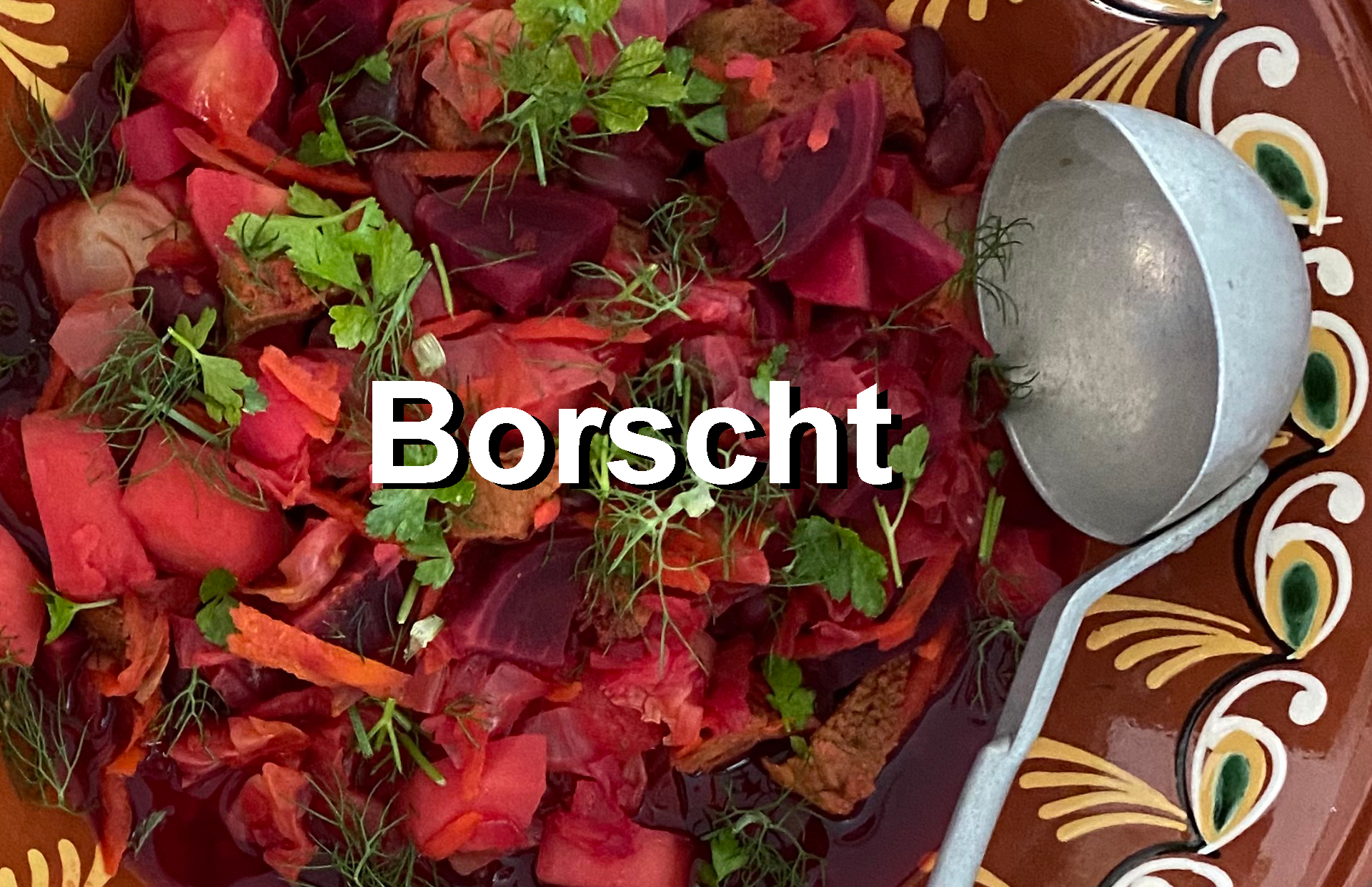 Close up of red beet soup with ladle