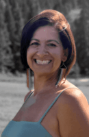 Woman with brown hair smiling